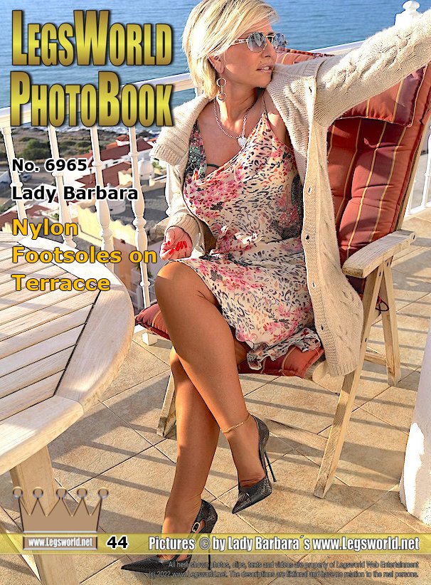 Ebook: 6965 - Lady Barbara
Nylon Footsoles on Terrace
Today you can see me on the terrace in Spain in a cardigan and light brown sheer stockings. Under the thin dress Im wearing tight breast bands again today instead of a bra. I love that every now and then. After Ive taken off my pointy RoSa pumps (made in England), I put my sweaty feet on the table, which are wrapped in delicate French nylon stockings. You can almost smell the scent of my wet soles.
