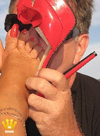 Lady Barbara : My new, bright red platform mules are super hot. Not only I think so, but also this member, who first kisses the soles and heels of the shoes and then take  also my toes into his mouth. And when do you want my sexy feet?