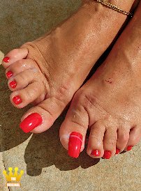 Lady Barbara : Today Ill show you some close-ups of my tanned feet with bright red painted toes. There is also a 15-minute video in slow motion while dancing with bare feet and how I grab different objects with my bare toes. See in slow motio, how firmly my toes are squeezed to the floor in a normal barefoot dance and how someone is wanking therewhile on my toes.