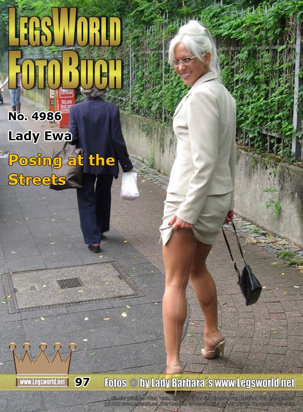 Ebook: 4986 - Lady Ewa
Posing at the Streets
In elegant costumes and high heels, we leave the House and go to Düsseldorf with the Porsche. Ewa should pose frivolous for a member on the streets in her beige suit and high-heeled mules, while I am doing the photos. If also other people are watching us?