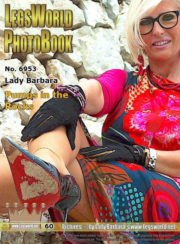 Ebook: 6953 - Lady Barbara
Pumps in the Rocks
Today I am posing for you in my rock garden in Spain with black designer pumps, sheer beige nylon tights and a red summer dress. It has been raining a bit the last few days. The wet streets really took a toll on my luxury pumps and the red soles are pretty worn out. I think they need a slave tongue to clean them.