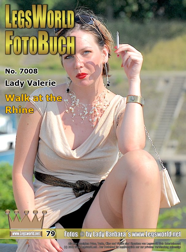 Ebook: 7008 - Lady Valerie
Walk at the Rhine
In a slightly transparent beige summer dress, skin-colored nylon stockings and sandals with platforms, Valerie strolls along the Rhine promenade in Krefeld. She has some very shy peepers in tow who prefer to keep a low profile in front of the camera. But once the camera is packed, they tell us how they enjoy watching the young Russian smoke a cigarette while pulling up her dress and showing the stockings.
