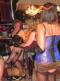 Lady-B-Privatparty : Beneath me, Joanna, Monique and a hot lady are treating a few slaves, wich sometimes even themselves are weraing high heeled boots. Trampling and the whip were just on the program as some nice dancing with our 