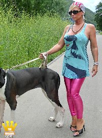 Lady Barbara : Last weekend we had made a trip with the dog into the region of Eifel and Mosel. Sometimes I dont know who is more striking the men: the dog or me with my long toenails and the hard, long nipples who want to come through the material of my top. Here I go for a walk in tight leggings and high-heeled mules on the Moselle river with my dog.
