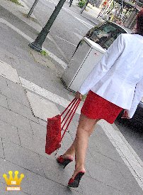 Lady Gina : With an elegant red and white suit and a transparent black blouse underneath, the mature, elegant Gina staggers lonely through the city of Düsseldorf on 14 cm high heeled mules. And so she promptly attracted a peeper who photographed the Polish woman on her stroll. Lucky for us. As you could see, this peeper wasnt the only one staring at Gina. There were a lot of open and secret glances from male passers-by for the woman with the transparent blouse.
